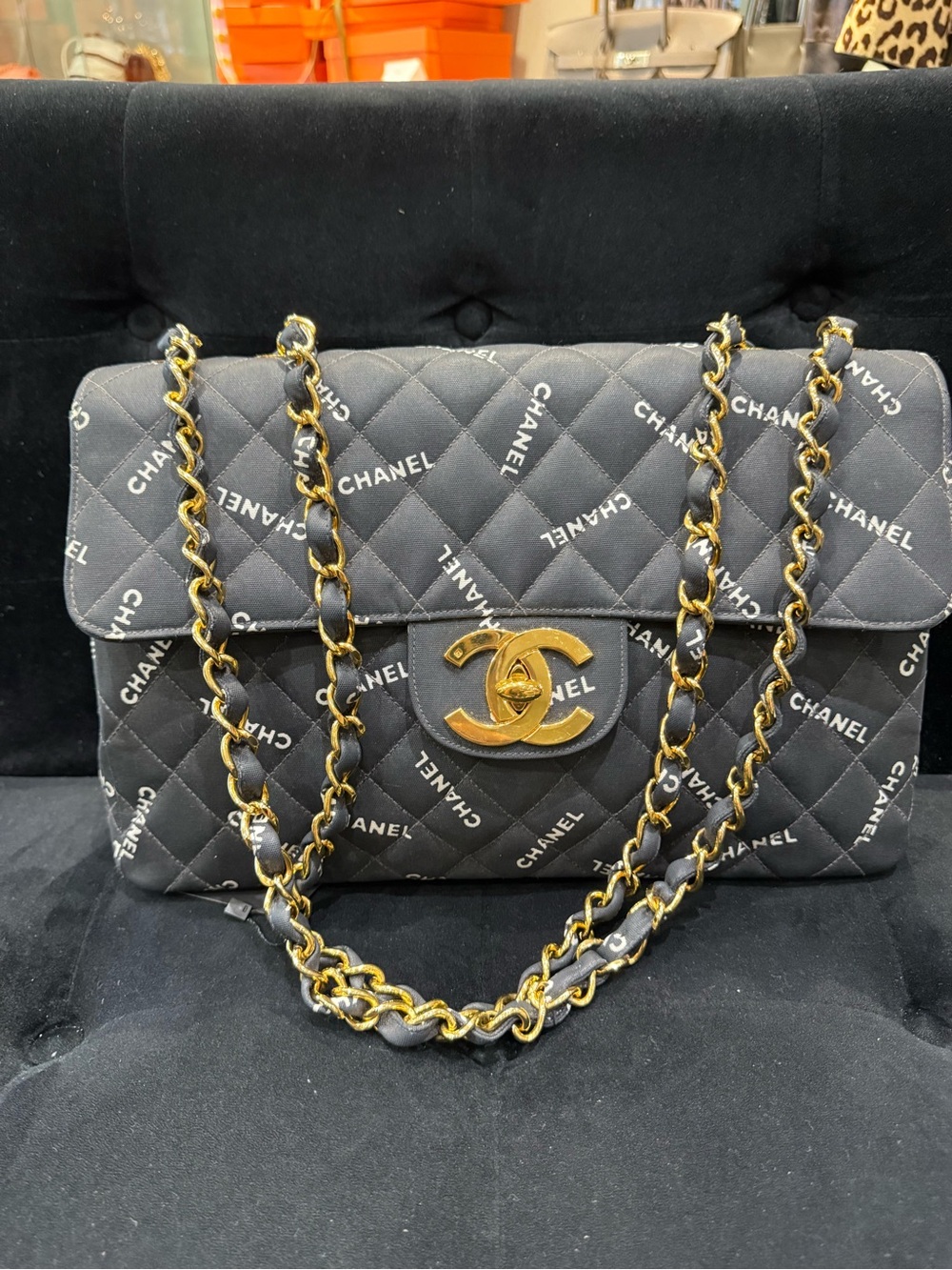 CHANEL Black Quilted Logo Shoulder Bag with Gold Hardware